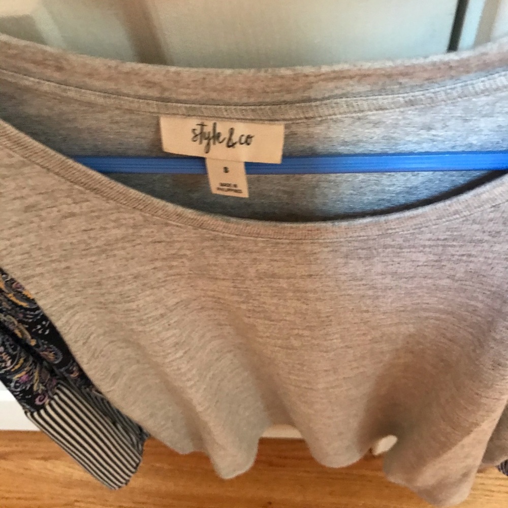 Soft bodice with silky sleeves.